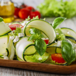 Zucchini salad with tomatoes and cheese